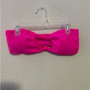 Brand new shown swim top. Size medium